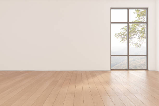 istock 3d rendering of empty room with wooden floor on tree background. 1354811084