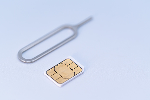 Image of smartphone SIM card taken on a white background