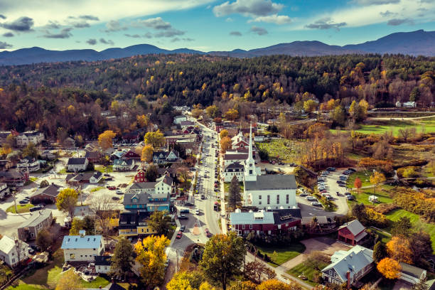 aerial view of main street and white community church in ski town stowe, vermont - town rural scene road new england imagens e fotografias de stock