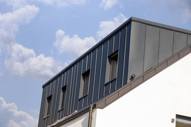 istock Newly tiled roof with large dormer with standing seam cladding 1354819184