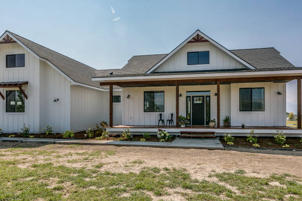 White modern farmhouse with board and batten siding