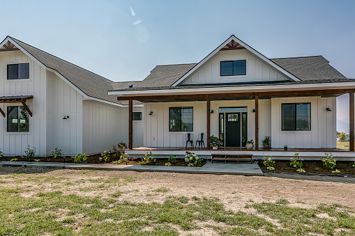 New home with large front porch and new roof