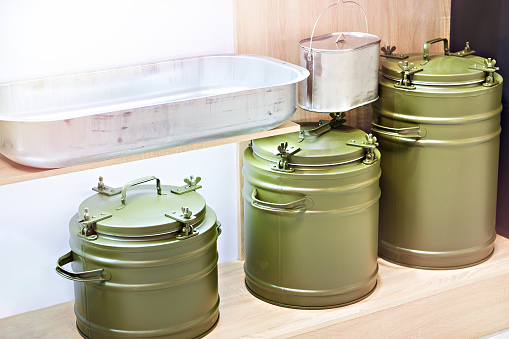 Army green metal thermos on store exhibition