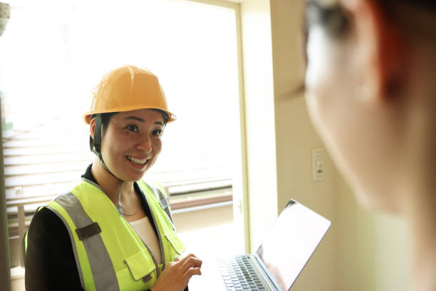 istock Utility worker explaining to the homeowner their service plan or what equipment they plan on installing 1354821617