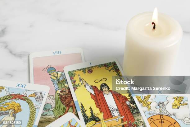 Assortment Of Tarot Inspired Cards On A Marble Stock Photo - Download Image Now - Tarot Cards, Playing Card, Backgrounds