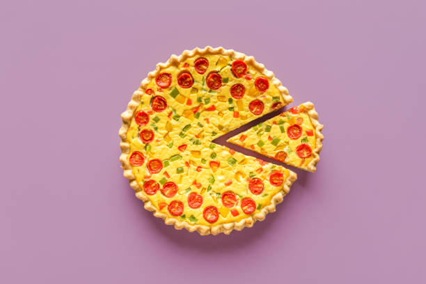 Delicious quiche with broccoli, chicken or salmon and cheese with salt and spices on a white background