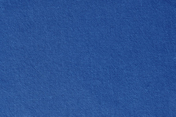 textura de tela de algodón azul para fondo, patrón textil natural. - tejido textil fotografías e imágenes de stock