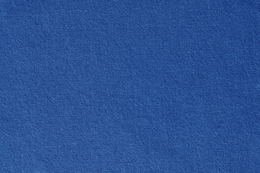 Blue cotton fabric cloth texture for background, natural textile pattern.