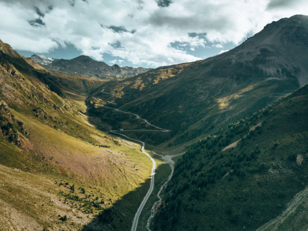 istock sneaking road in the dolomites 1354827178