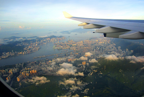 Aerial view of Hong Kong Island, Kowloon peninsula, Victoria Harbour and east new territories from a plane.