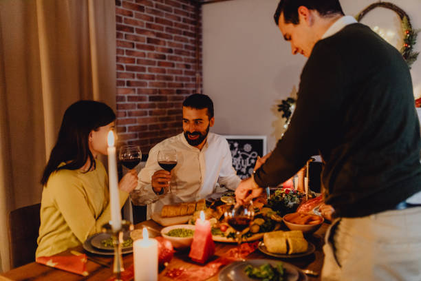 istock New year dinner at home with friends 1354831348