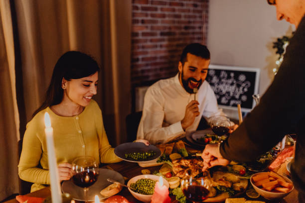 istock New year dinner at home with friends 1354831909