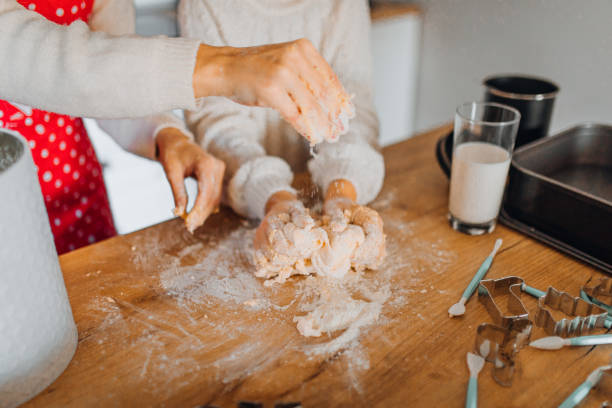 istock Mom with daughter on kitchen 1354838187