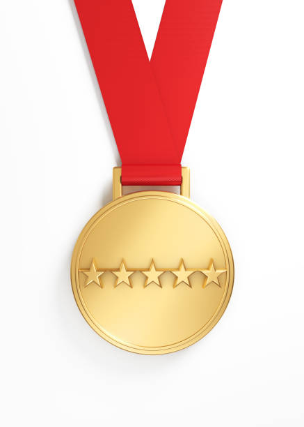 Gold medal with red ribbon isolated on white background.
