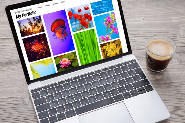 istock Laptop computer with nature photography portfolio on the screen 1354839091