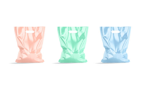 Blank colored full die-cut small plastic bag, handle hole mockup Blank colored full die-cut small plastic bag, handle hole mockup, 3d rendering. Empty diecut pack for supermarket stuff mock up, isolated, front view. Clear poly bagful or parcel template. small plastic bag stock pictures, royalty-free photos & images