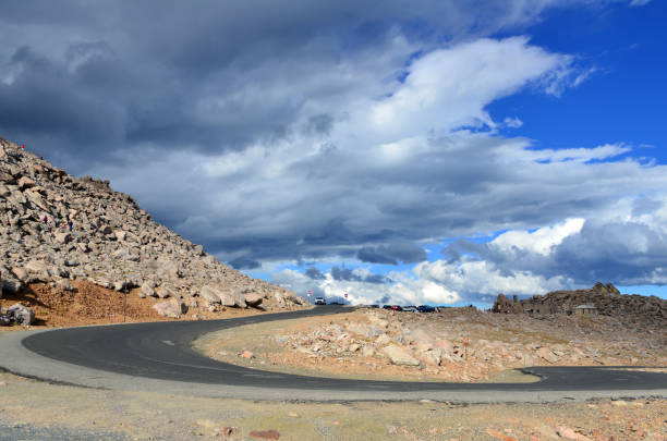 Mount Evans Scenic Byway approaching the summit under dramatic sky, Mount Evans, Colorado, USA: