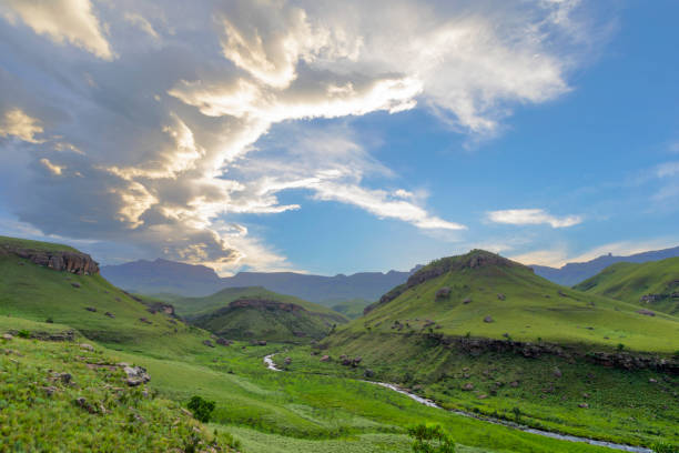 istock Cloud formation at sunset above the mountain Drakensberg 1354848125