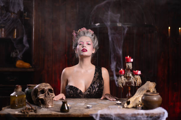 istock Portrait fortune teller woman reading future on magical cards. Magic and divination. 1354848151