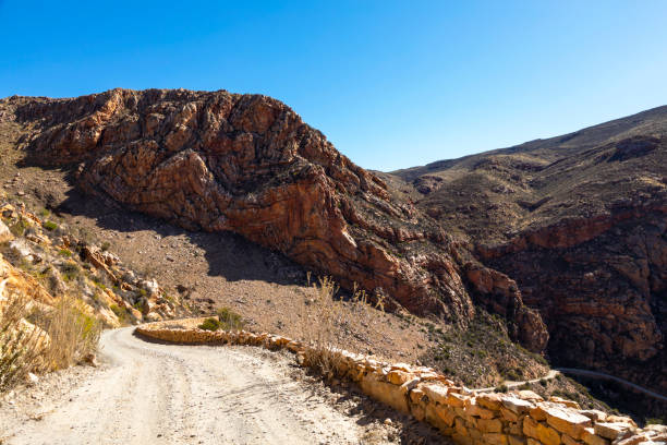 istock Swartberg Pass with deformed rock formation 1354848236