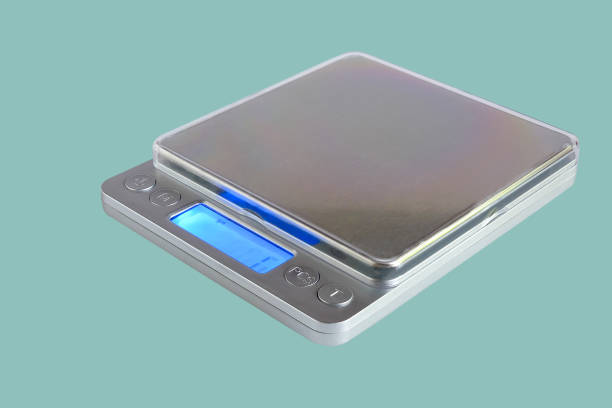 istock Small digital weighing scale for bakery measure. 1354848791