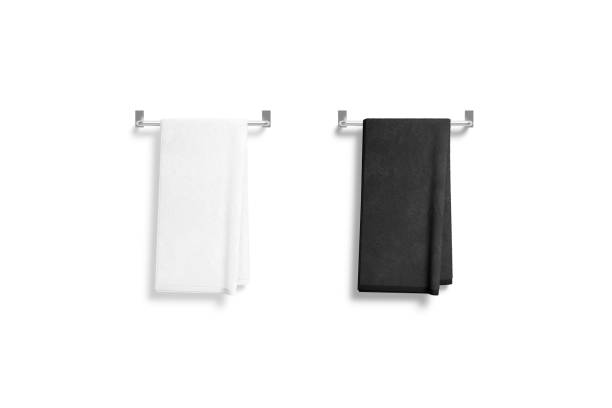 Blank black and white towel on heated rail mockup, isolated