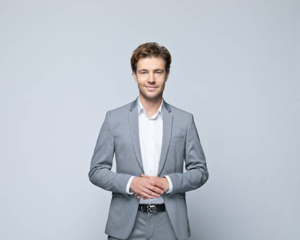 istock Portrait of friendly young businessman 1354853013