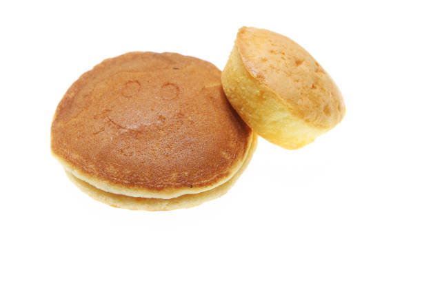 istock Pan cake double layer and cup cake isolated on a white background with copy space for text. 1354854510
