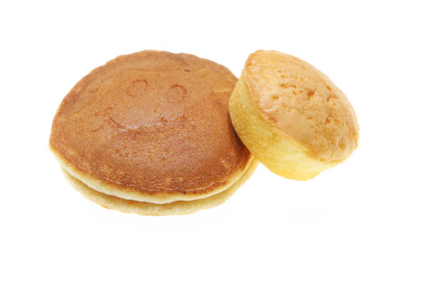 istock Pan cake double layer and cup cake isolated on a white background with copy space for text. 1354854551