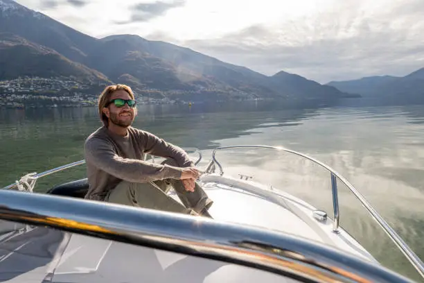 Male enjoying the lake and the mountains in Autumn.
Ticino canton, Switzerland