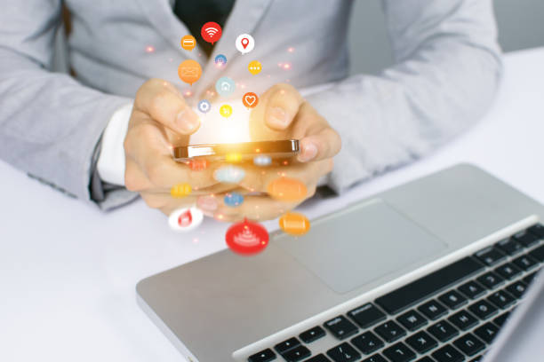 istock Business people are using innovative technology. Mixed media, digital concepts and computer whit phone. 1354864008