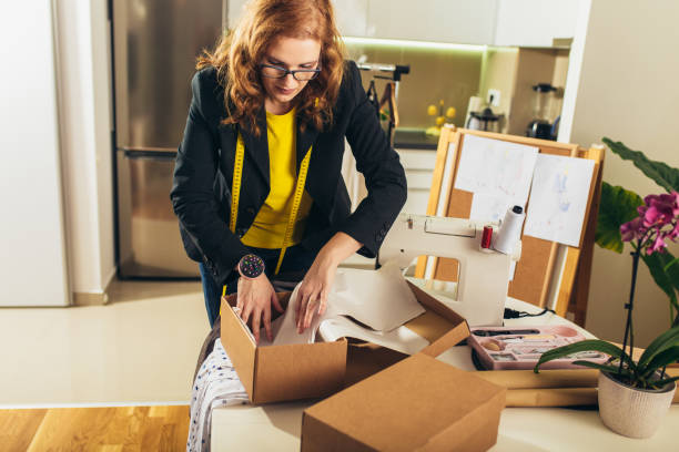 istock Seamstress woman at home accepting new orders 1354864172