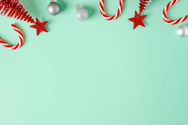 istock top view christmas ornament xmas tree,candy cane,bauble decor on pastel green background 1354864555