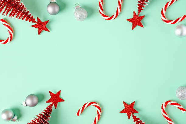 istock top view christmas ornament xmas tree,candy cane,bauble decor on pastel green background 1354864614