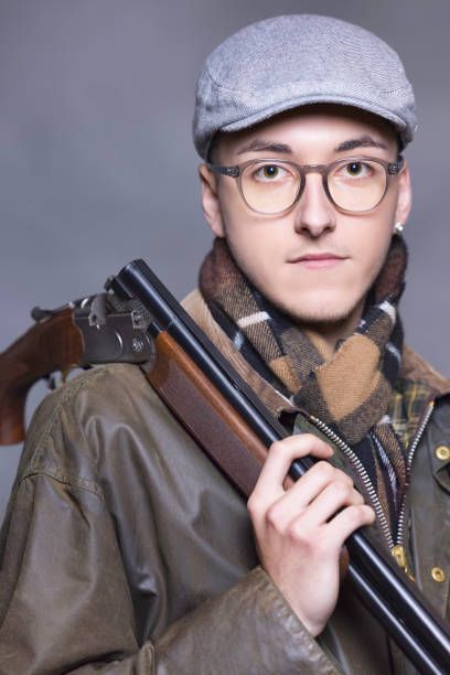 istock Youth with his shotgun 1354865145