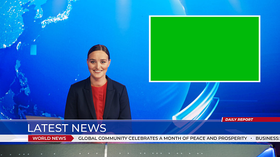Live News Studio with Beautiful Female Anchor Reporting on a Story, Using Green Chroma Key Screen Placeholder Copy Space. Television Newsroom Channel with Professional Presenter