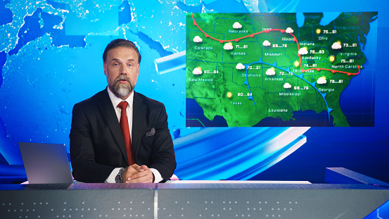 Media reporter presents news with greenscreen template, talking about daily events on live international television. Journalist using blank copyspace mockup in newsroom, show host.