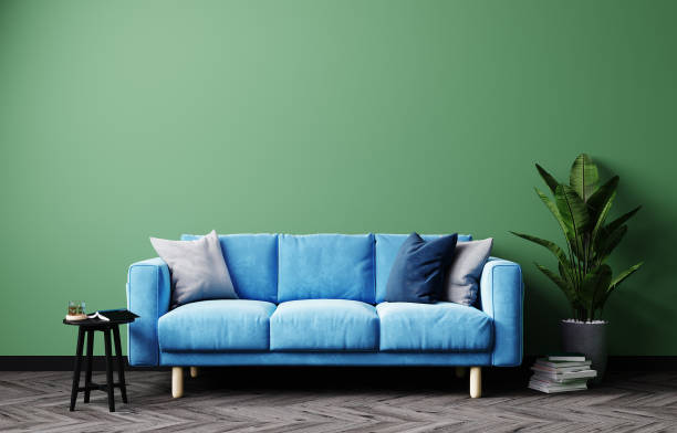 istock Bright interior with blue sofa and green wall, modern living room interior. 3d rendering 1354869526