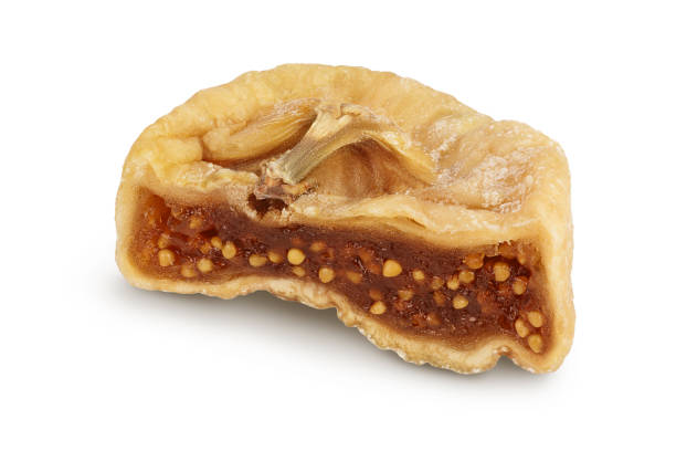 istock dried fig half isolated on white background with clipping path and full depth of field 1354876169