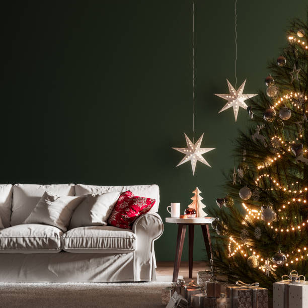 istock Christmas interior with Christmas tree and empty green wall background 1354876711