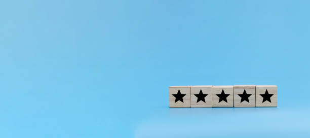 istock High Quality. five star icon on wooden cube block stack on blue background, customer feedback, creative idea, business strategy, online marketing, positive thinking, customer satisfaction concept 1354880446