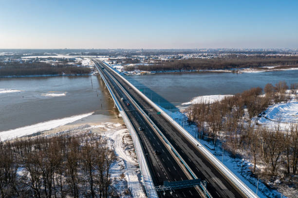 istock Bridge across the river aerial view 1354884436