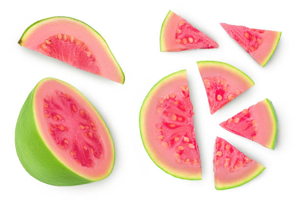 istock Guava fruit slices isolated on white background . Top view. Flat lay 1354885987