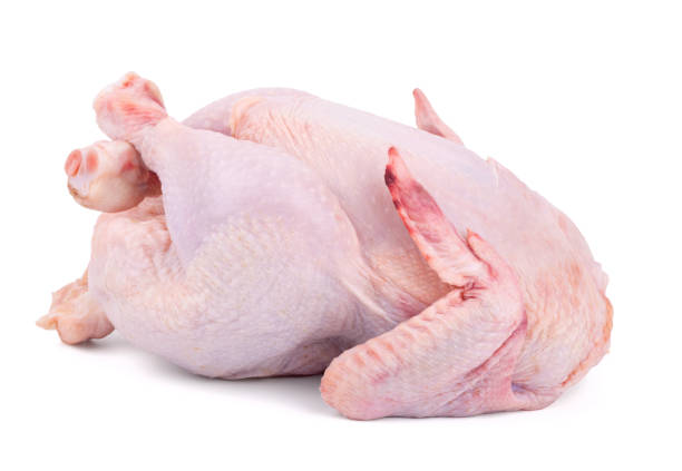istock raw fresh chicken isolated on white background close up 1354889824