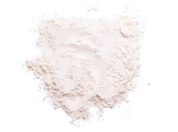istock flour isolated on white background top view 1354889867
