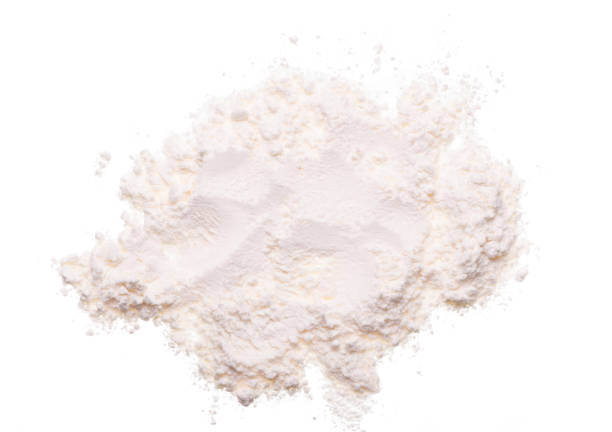 istock flour isolated on white background top view 1354889920