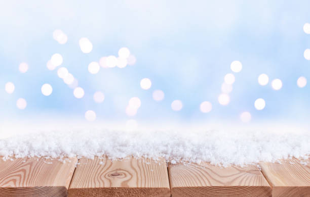 istock Christmas background with wooden table top 1354891035