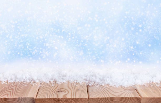 istock Christmas background with wooden table top 1354891508