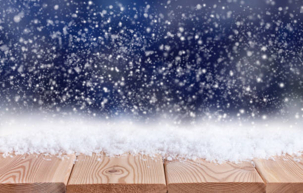 istock Christmas background with wooden table top 1354891525