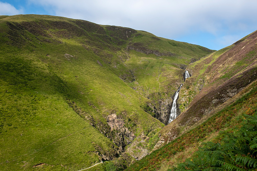 Scenic view along the Grey Mare’s Tail Waterfall trail near Moffatt in Scotland.